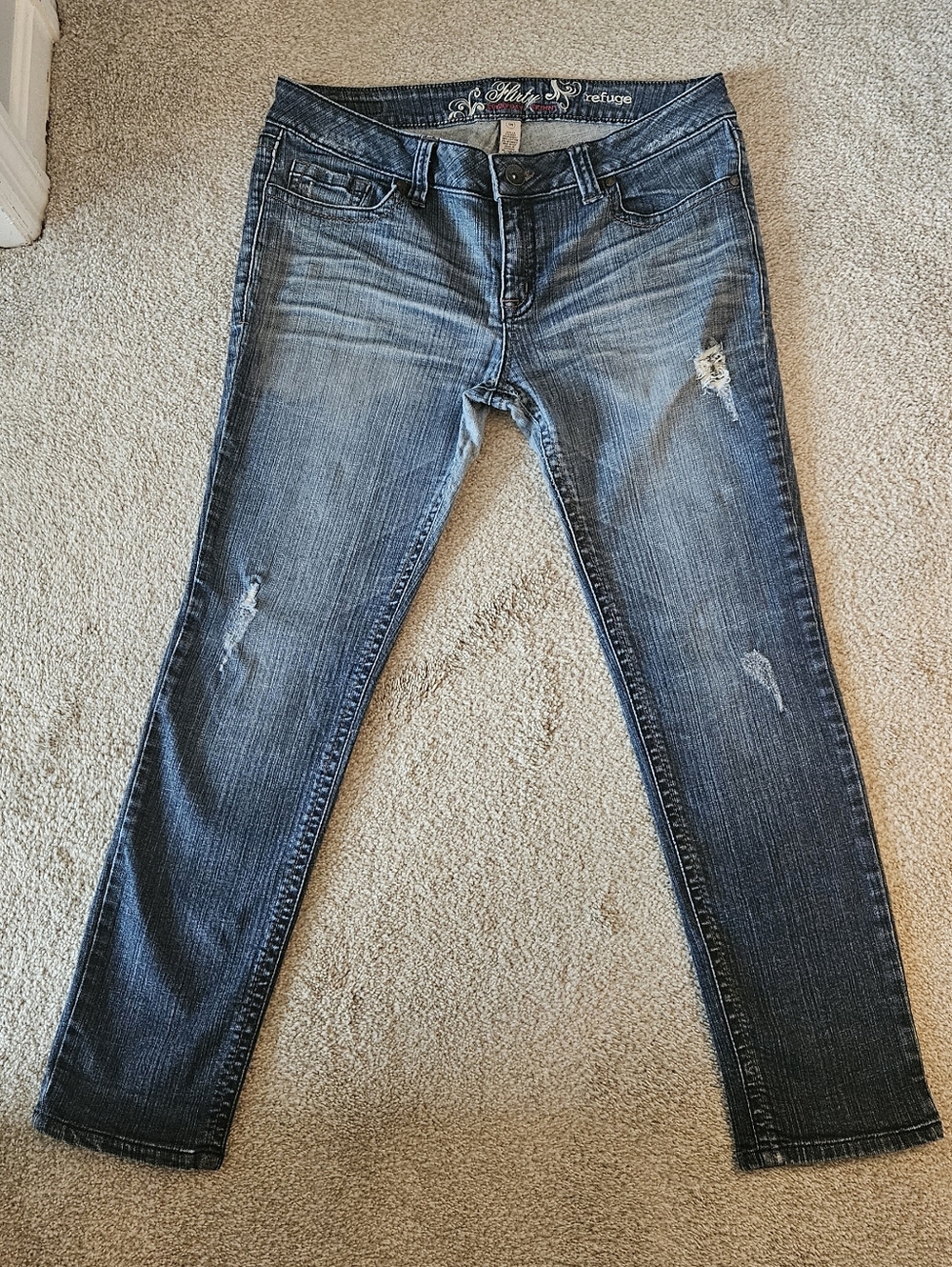 refuge Women's Faded Blue Skinny Jeans with Light Distressing
